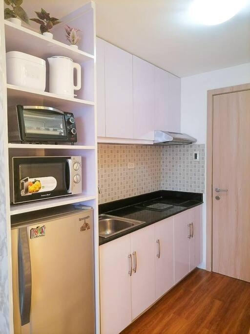 Cozy Studio Unit At Sun Residences Quezon City Bagian luar foto